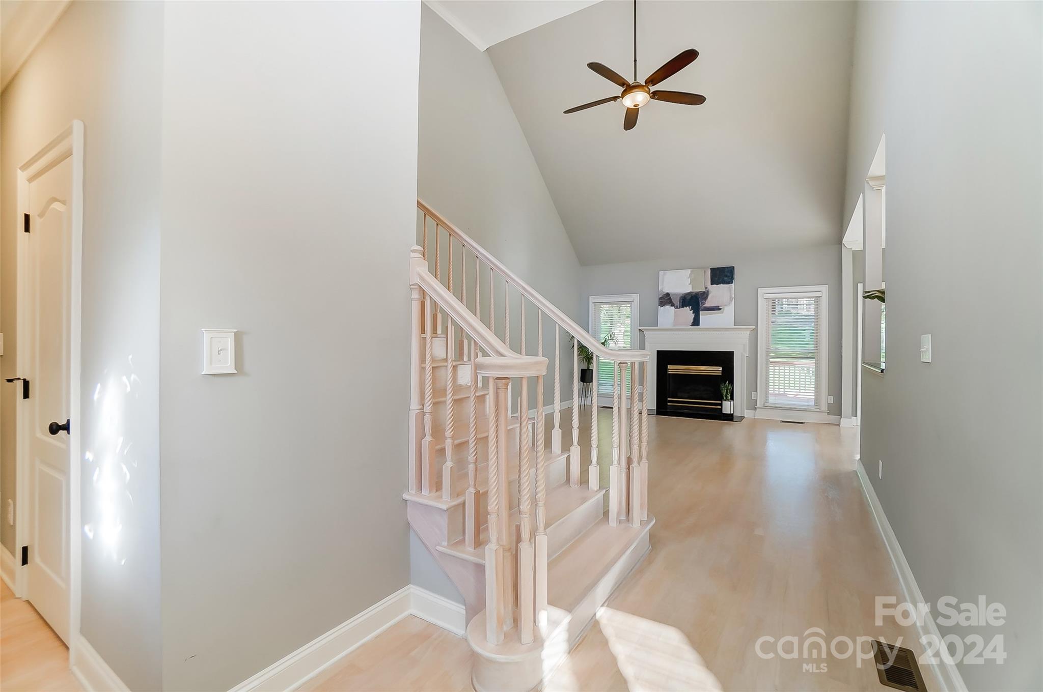 657 Portpatrick Place Fort Mill, SC 29708 - Photo 7 of 46 a view of entryway and hall with wooden floor