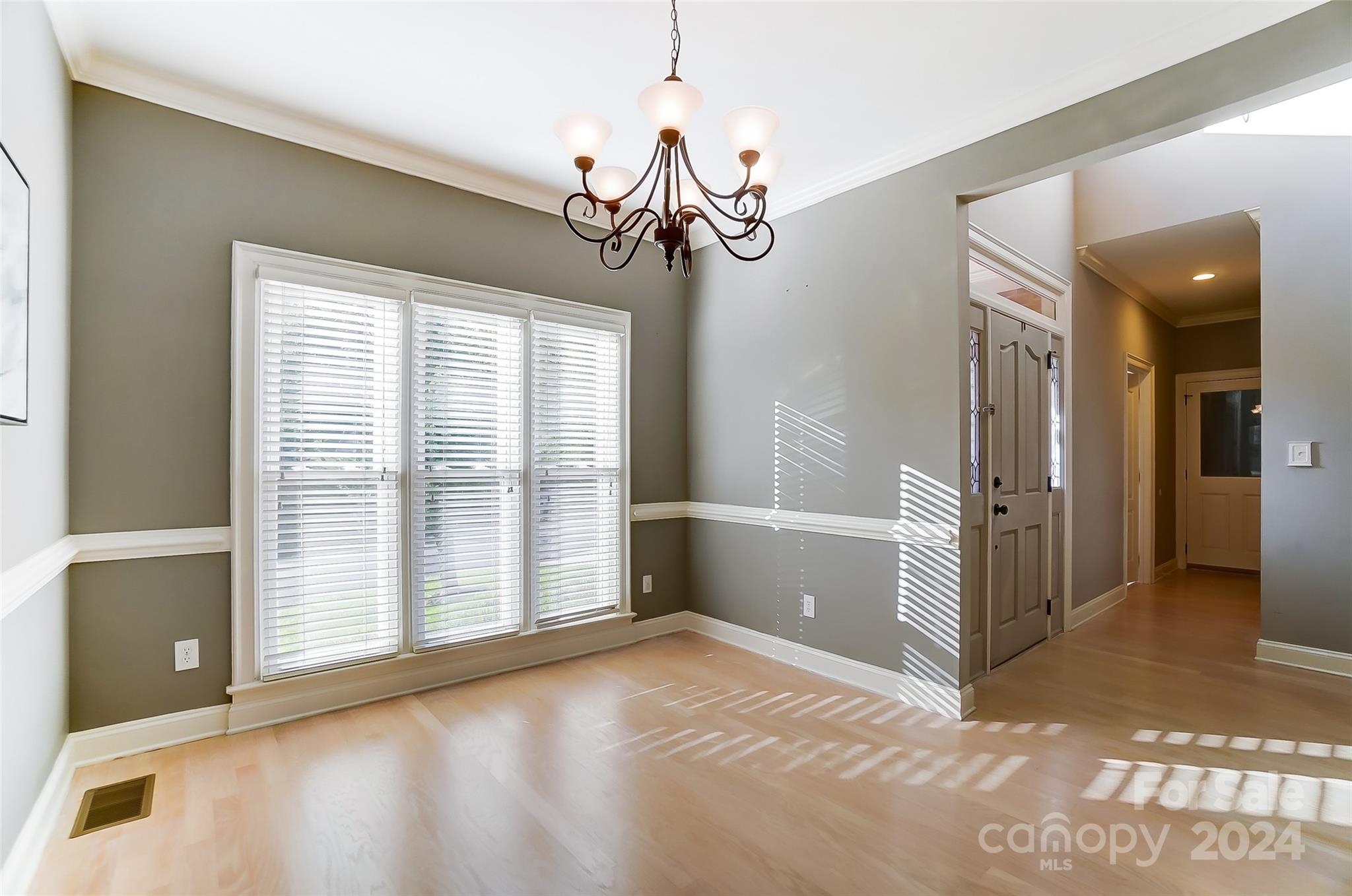 657 Portpatrick Place Fort Mill, SC 29708 - Photo 9 of 46 a view of a livingroom with a ceiling fan and window