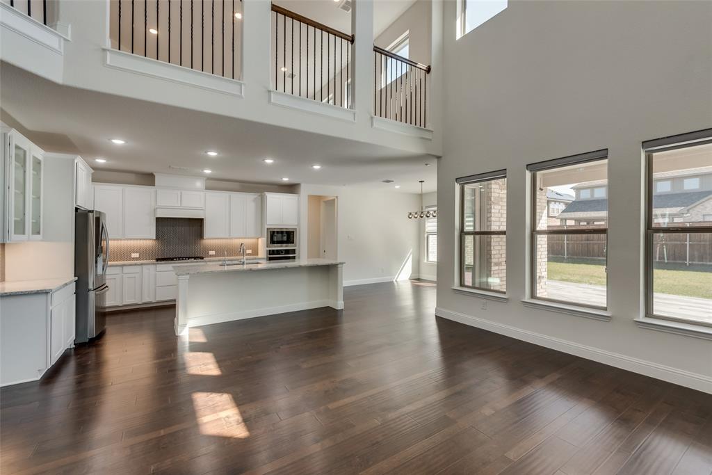 16476 Ryder Rock Road Frisco, TX 75033 - Photo 40 of 40 Kitchen and dining room area w/ open floor plan