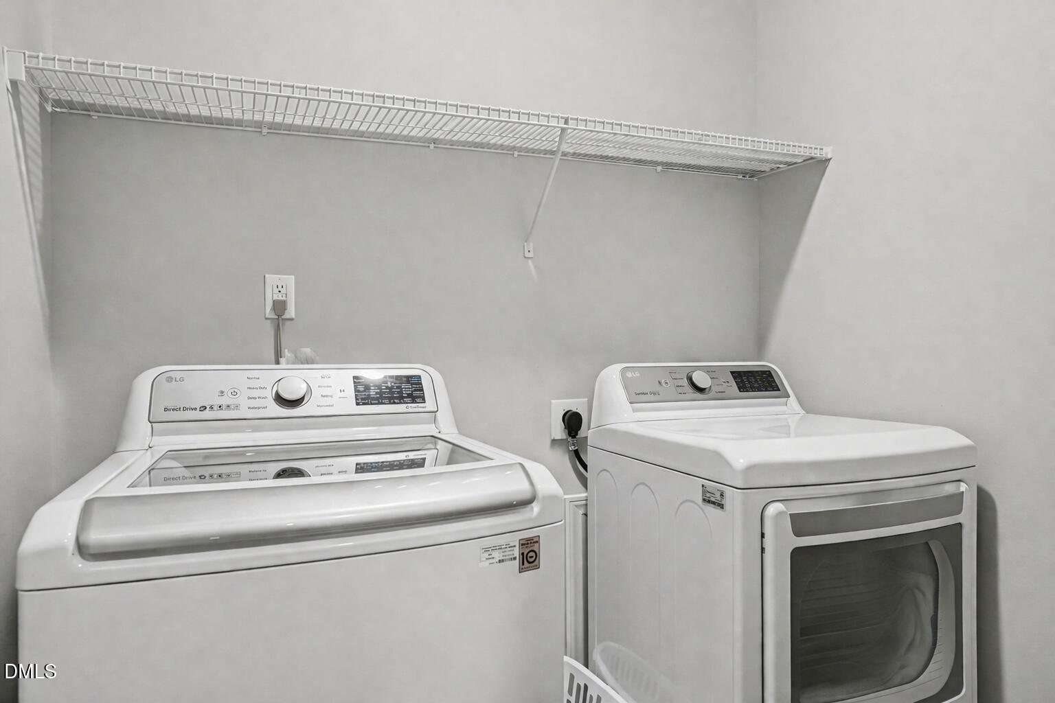 130 Aylebury Ridge Zebulon, NC 27597 - Photo 17 of 41 a view of washer and dryer with bathroom