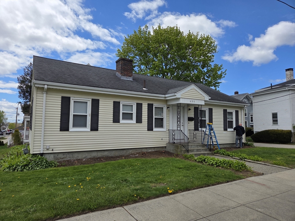 499 Maple Street Fall River, MA 02720 - Photo 2 of 21 a front view of house with yard and green space