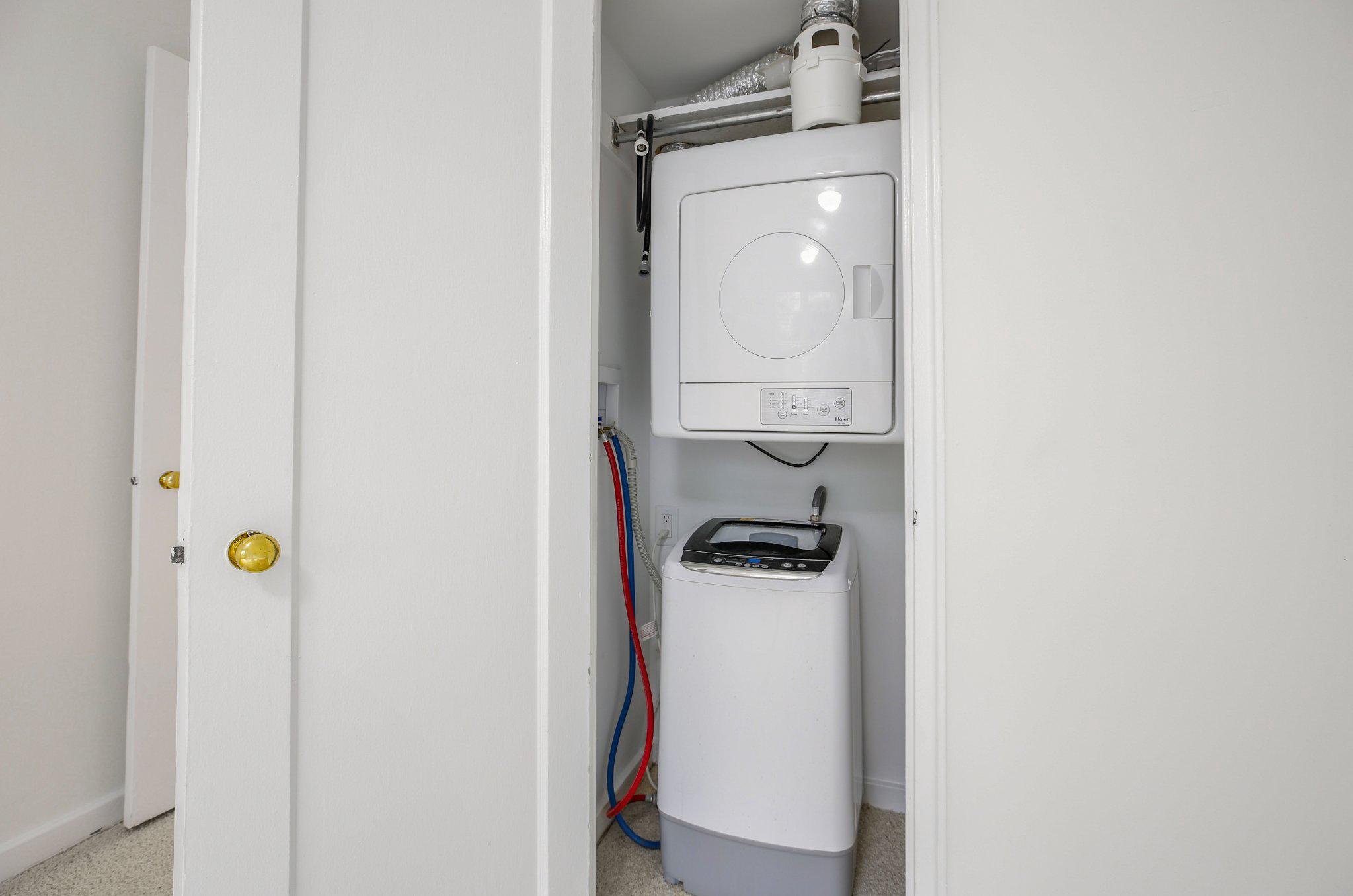 2202 Colston Drive, Unit 102 Silver Spring, MD 20910 - Photo 18 of 38 a utility room with dryer and washer