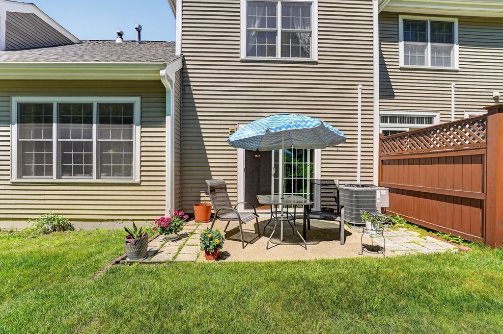 15 Evergreen Circle, Unit 15 Canton, MA 02021 - Photo 25 of 29 a house view with a garden space