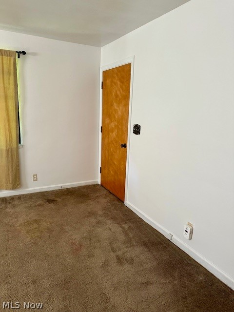 751 Thayer Street, Unit DOWN Akron, OH 44310 - Photo 6 of 25 Empty room featuring carpet floors