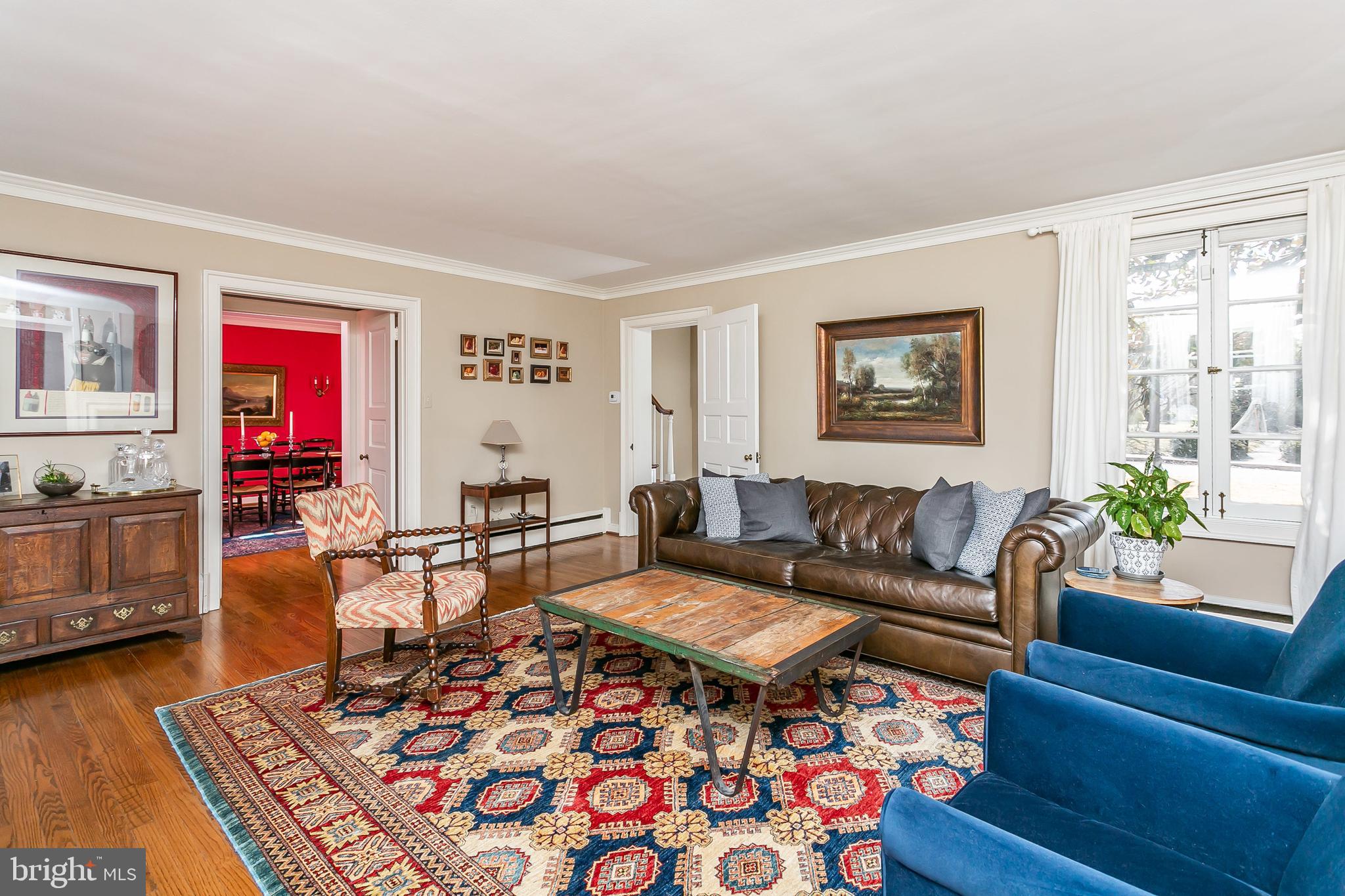 110 Churchwardens Road Baltimore, MD 21212 - Photo 6 of 32 Light filled Living Room flows to Dining Room