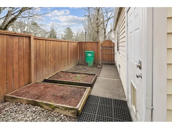 a view of a backyard with a garden