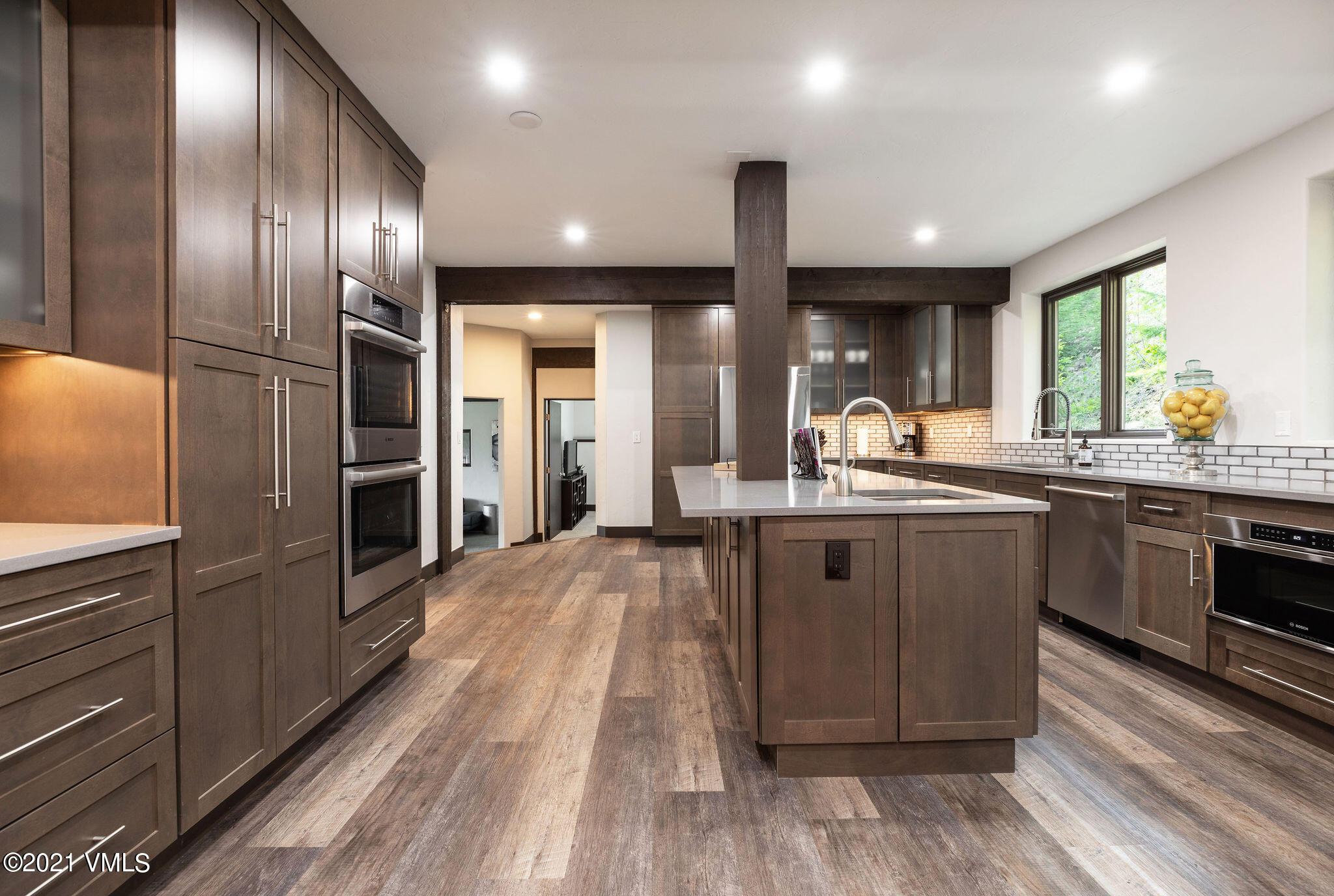 1074 Eagle Drive Eagle-Vail, CO 81620 - Photo 10 of 30 a kitchen with stainless steel appliances granite countertop a sink a stove and refrigerator