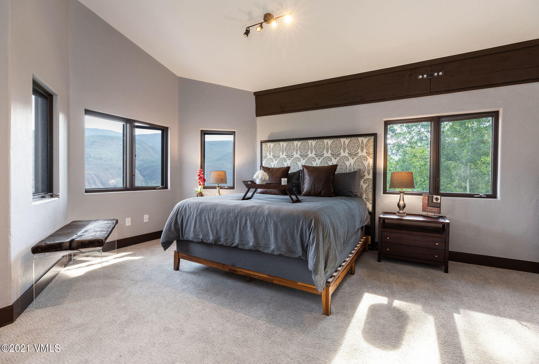 1074 Eagle Drive Eagle-Vail, CO 81620 - Photo 16 of 30 a bedroom with a bed and window