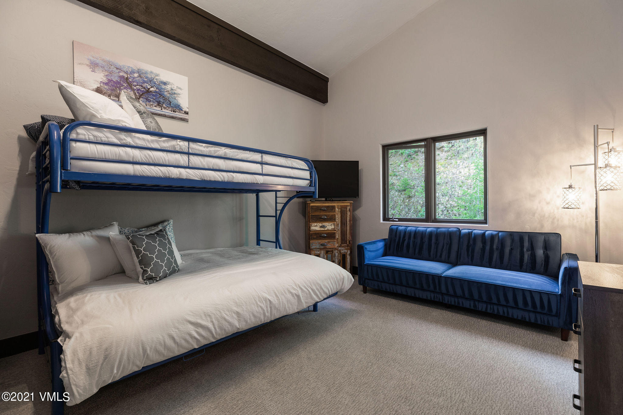 1074 Eagle Drive Eagle-Vail, CO 81620 - Photo 21 of 30 a bedroom with bed and window