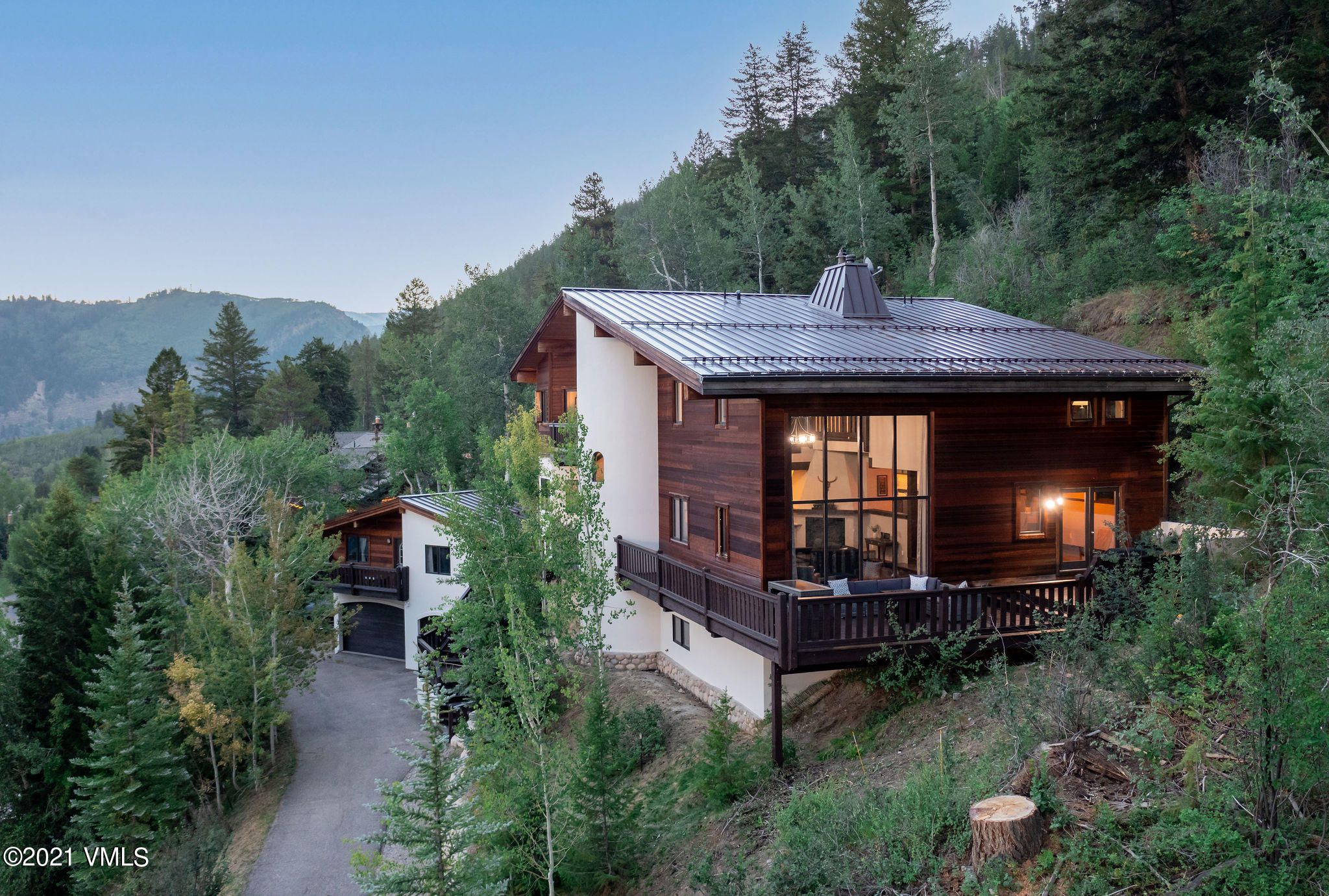 1074 Eagle Drive Eagle-Vail, CO 81620 - Photo 3 of 30 an aerial view of a house with a yard and mountain view in back