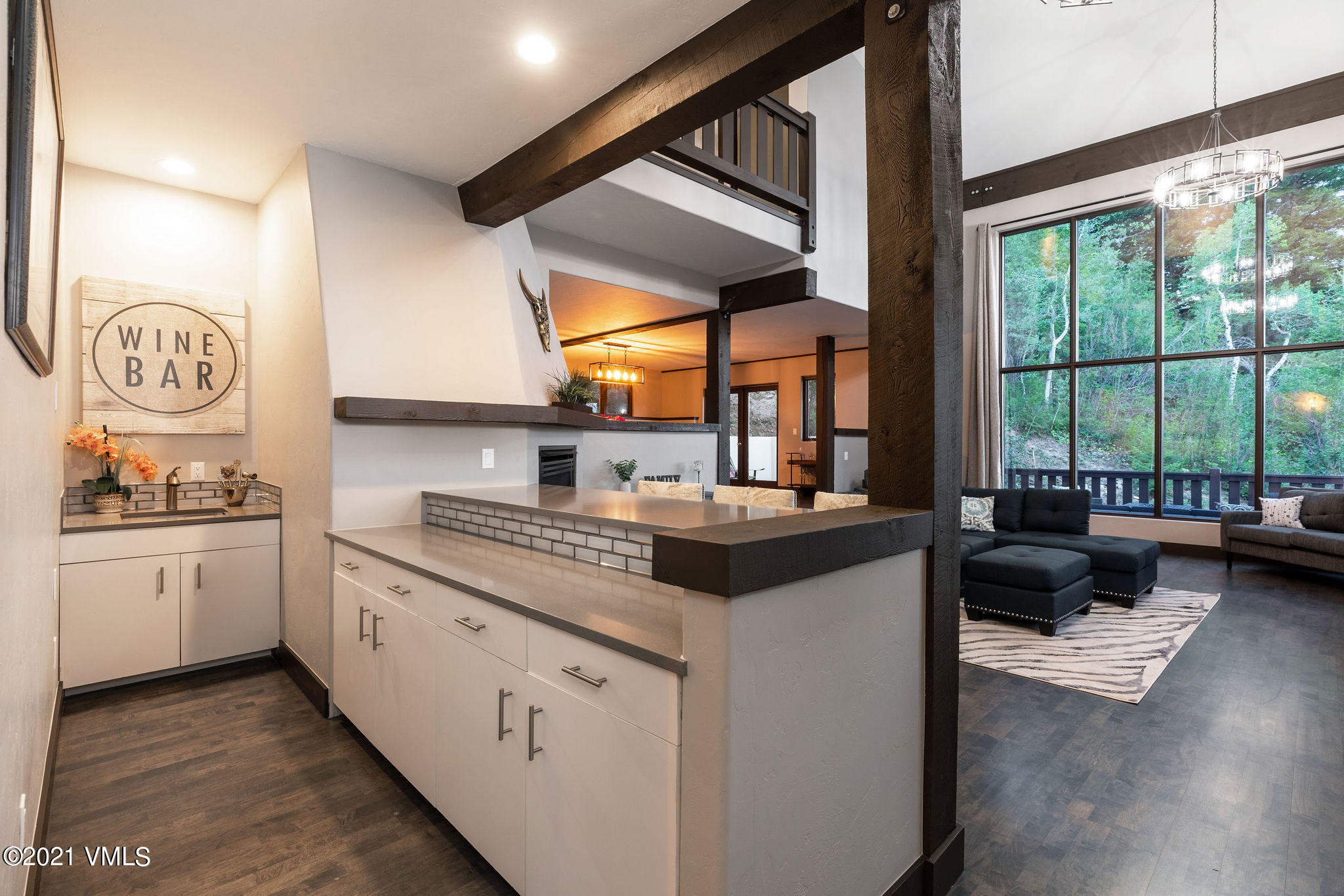 1074 Eagle Drive Eagle-Vail, CO 81620 - Photo 5 of 30 a kitchen with a stove a sink and a refrigerator