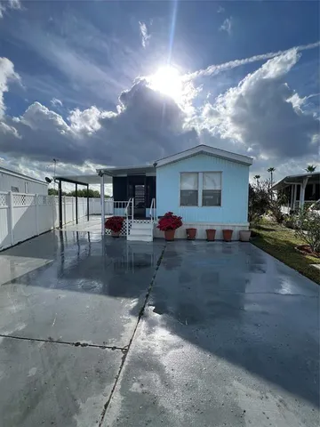 a view of outdoor space with porch and livingroom with furniture