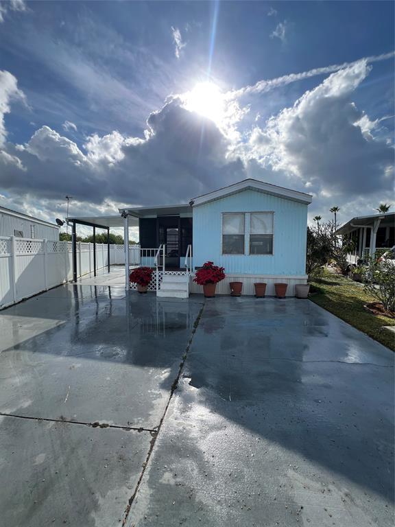 a view of outdoor space with porch and livingroom with furniture