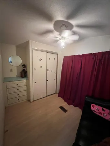 a view of a livingroom with furniture