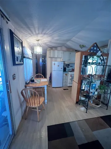 a room with furniture and a chandelier