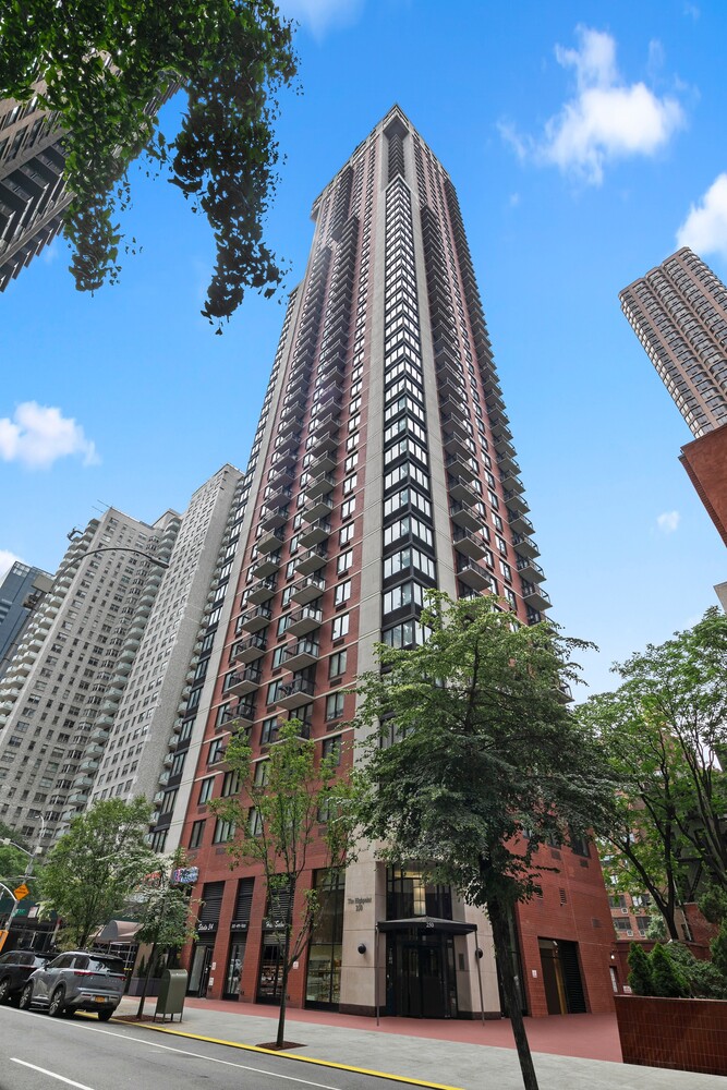 250 East 40th Street, Unit 21C Manhattan, NY 10016 - Photo 11 of 13 a view of a city with tall buildings
