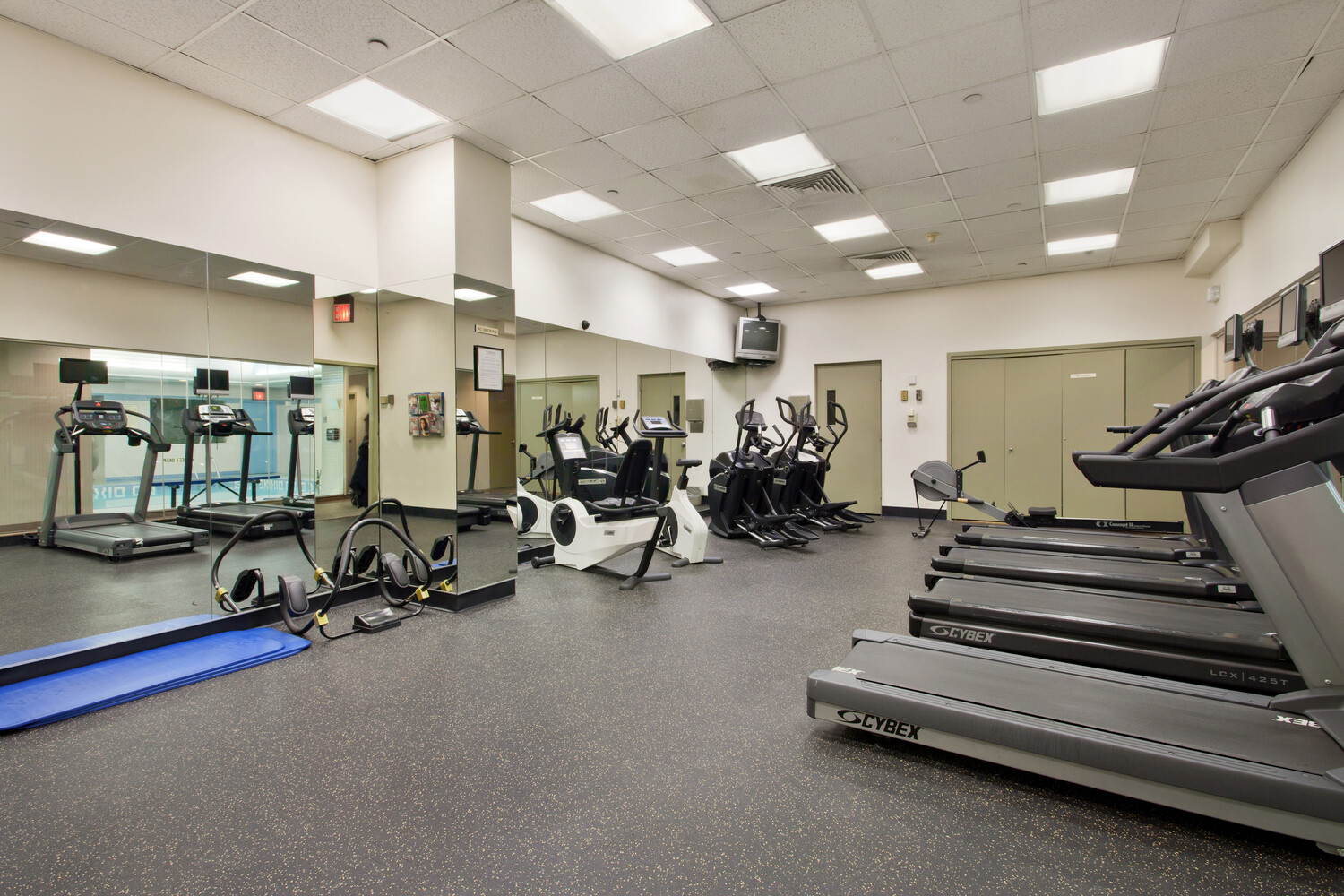 250 East 40th Street, Unit 21C Manhattan, NY 10016 - Photo 7 of 13 a view of a room with gym equipment