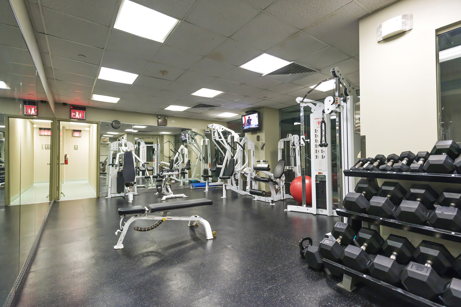 250 East 40th Street, Unit 21C Manhattan, NY 10016 - Photo 9 of 13 a view of a room with gym equipment