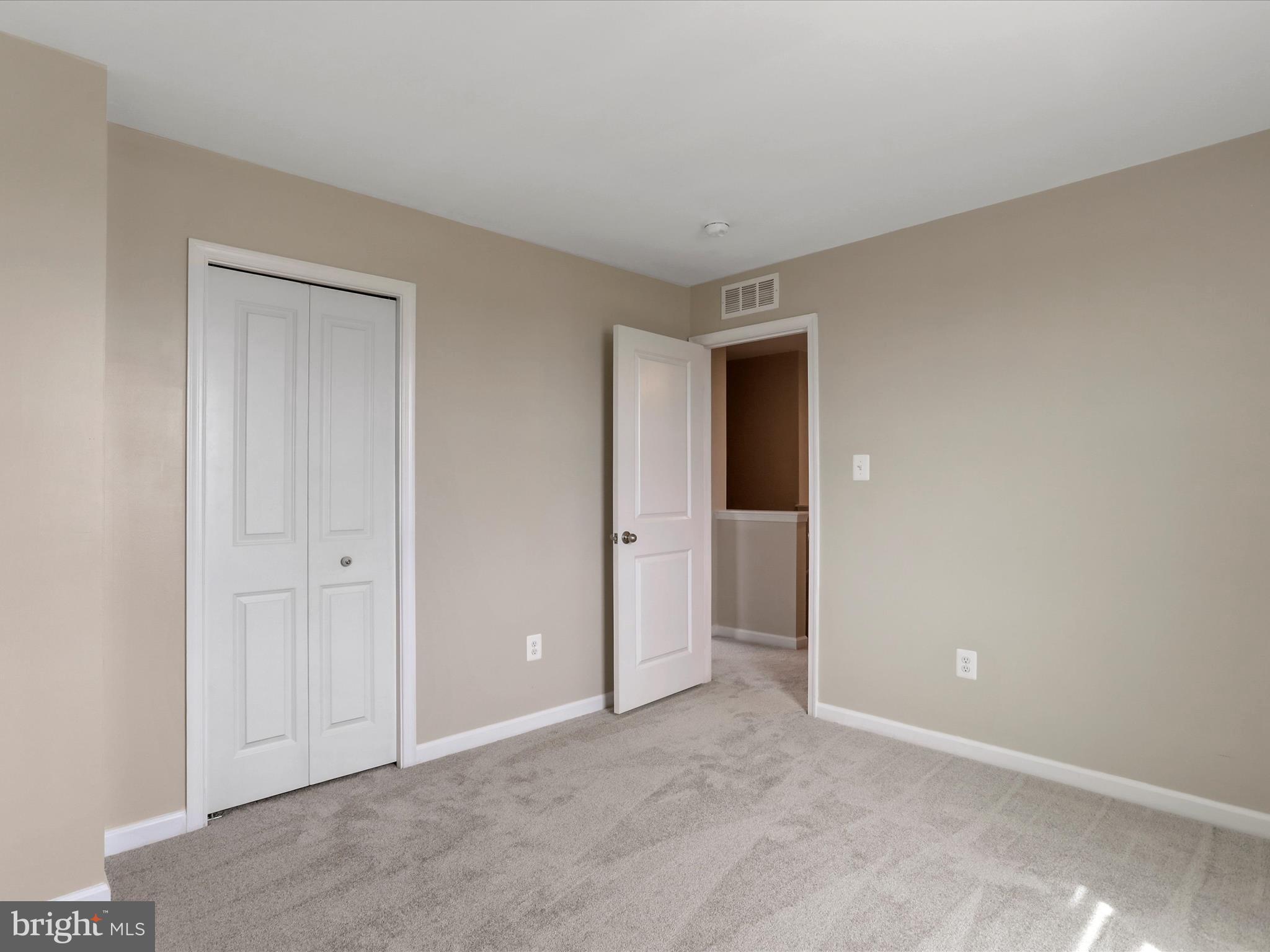 257 Switchgrass Court Bunker Hill, WV 25413 - Photo 13 of 26 a view of an empty room and closet area