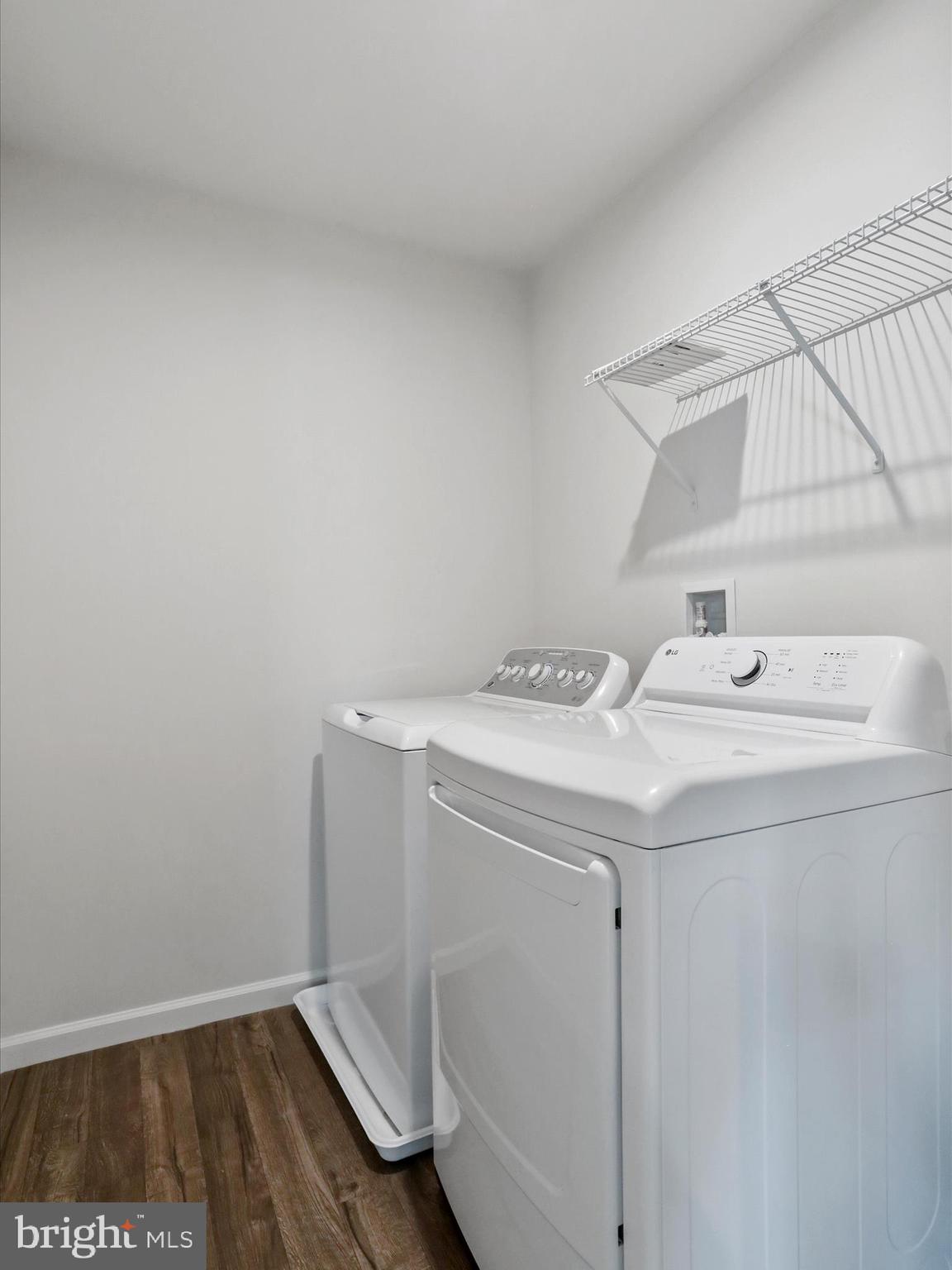 257 Switchgrass Court Bunker Hill, WV 25413 - Photo 16 of 26 a utility room with dryer and washer