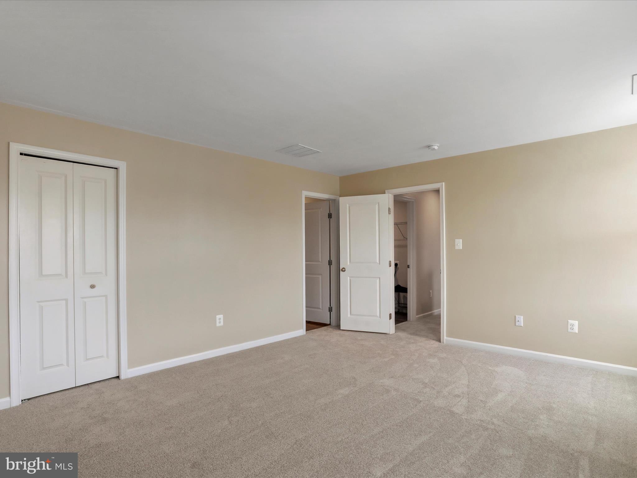 257 Switchgrass Court Bunker Hill, WV 25413 - Photo 18 of 26 a view of an empty room and closet area
