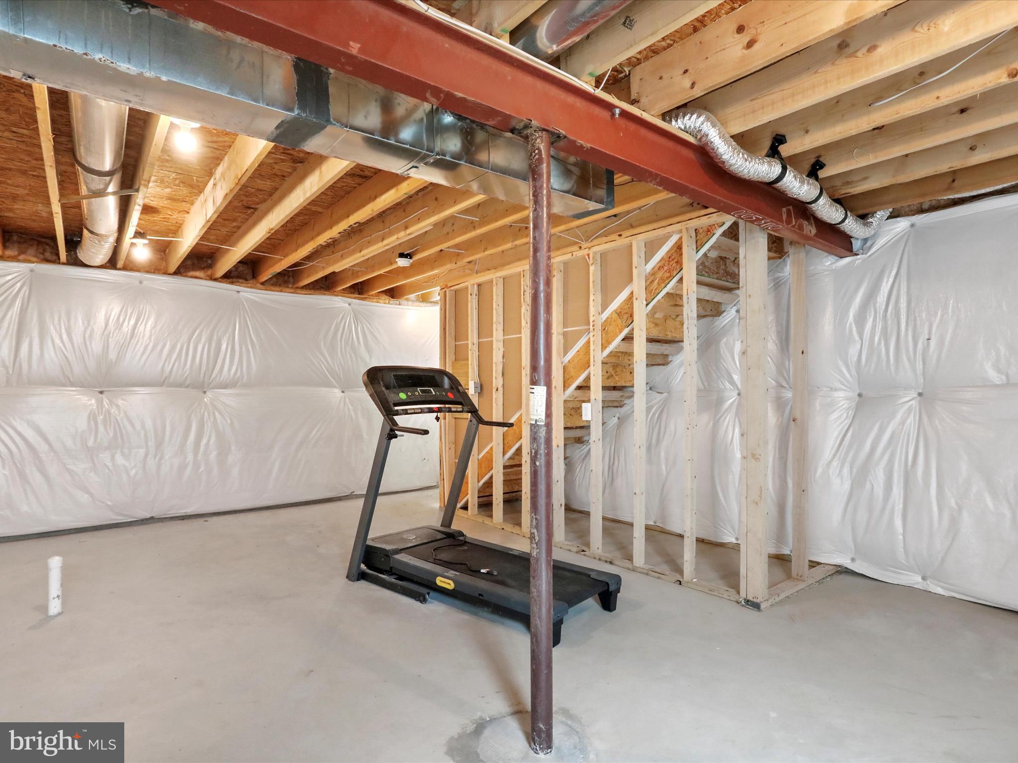 257 Switchgrass Court Bunker Hill, WV 25413 - Photo 23 of 26 a view of a room with gym equipment