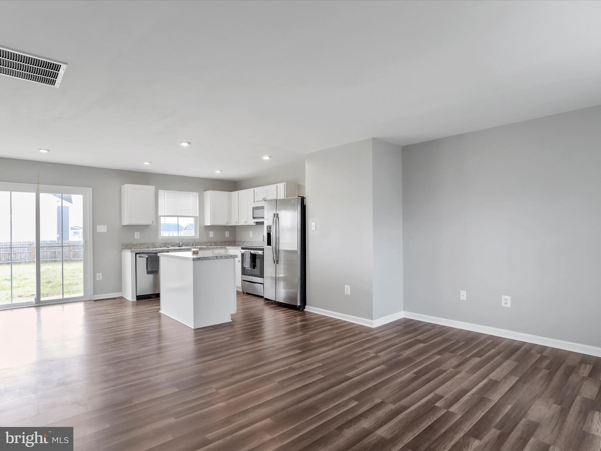 257 Switchgrass Court Bunker Hill, WV 25413 - Photo 5 of 26 a view of kitchen with wooden floor