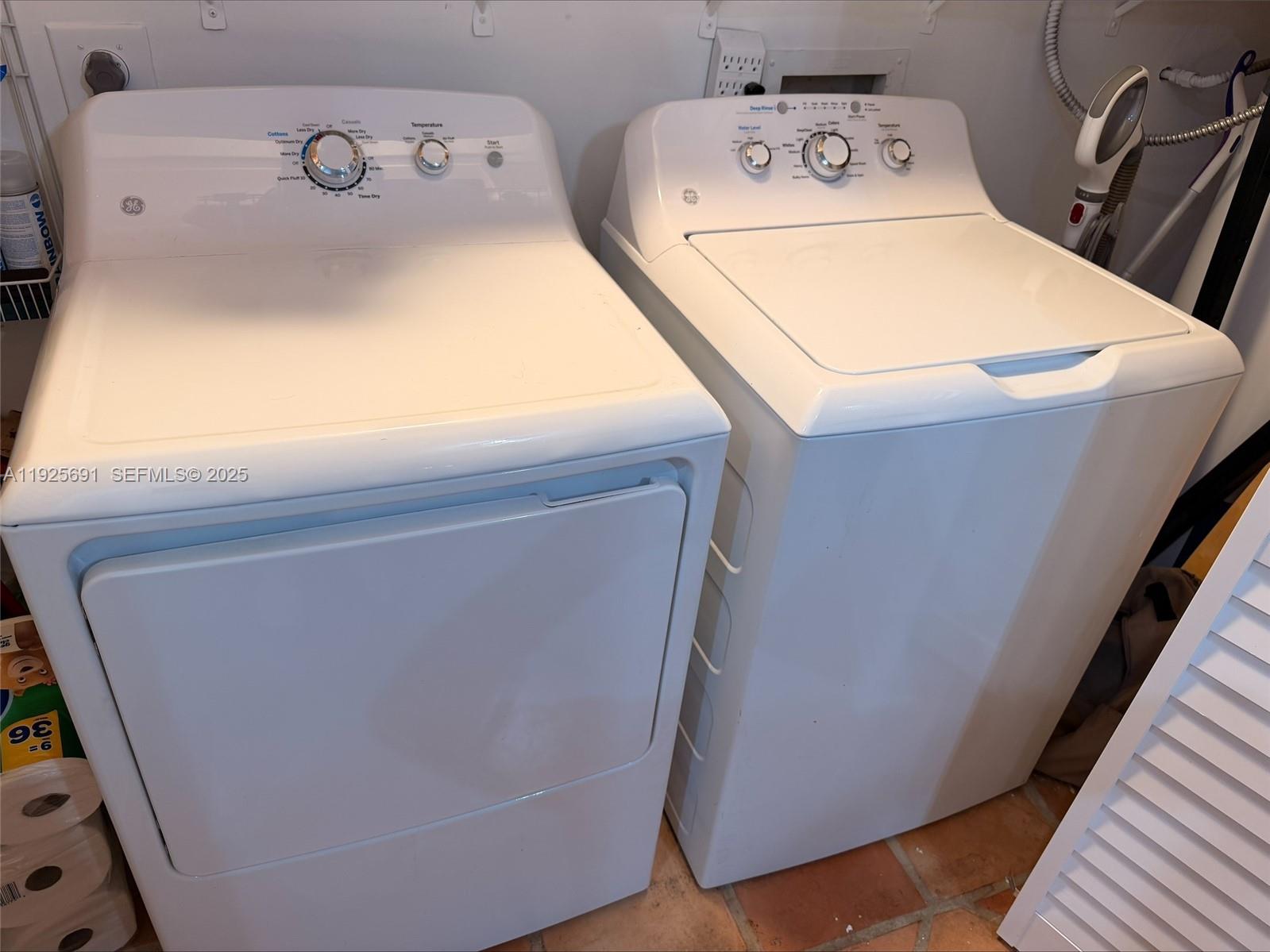 13680 Yarmouth Court, Unit C Wellington, FL 33414 - Photo 11 of 21 a utility room with dryer and washer