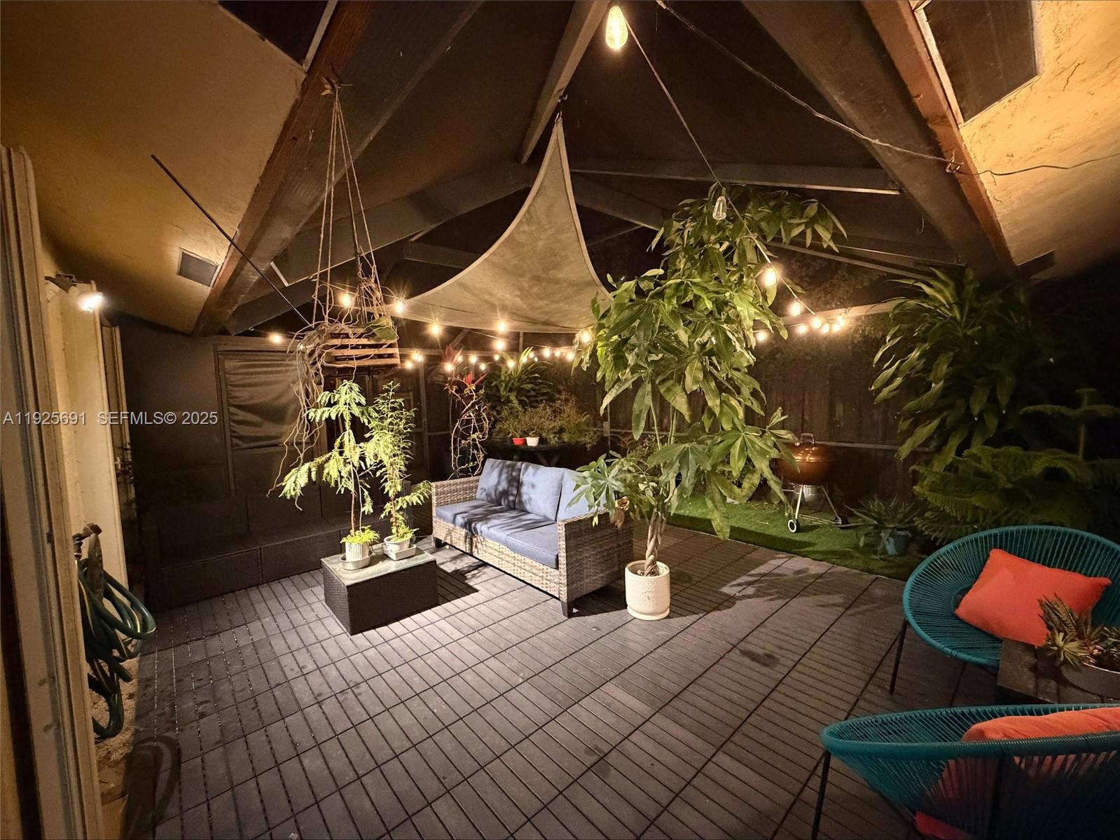 13680 Yarmouth Court, Unit C Wellington, FL 33414 - Photo 18 of 21 a outdoor space with sitting space