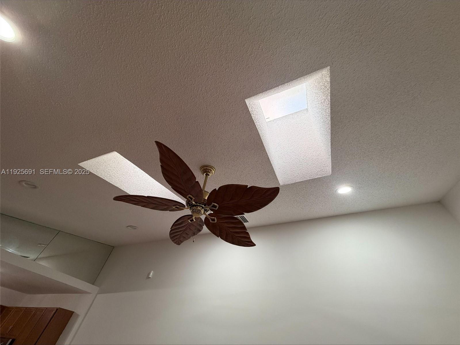 13680 Yarmouth Court, Unit C Wellington, FL 33414 - Photo 7 of 21 an empty room with windows