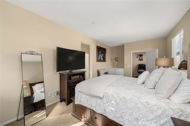 a bathroom with a sink vanity and a mirror
