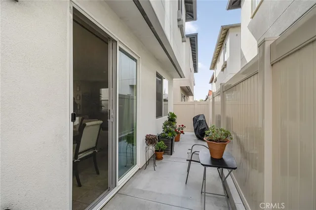 an aerial view of residential houses with city view