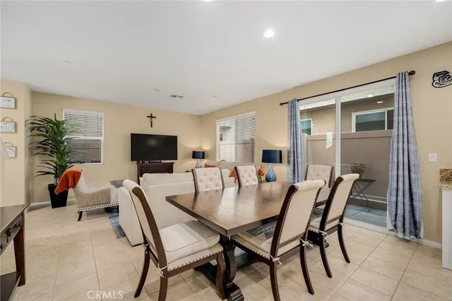 a kitchen with stainless steel appliances granite countertop a refrigerator sink and microwave