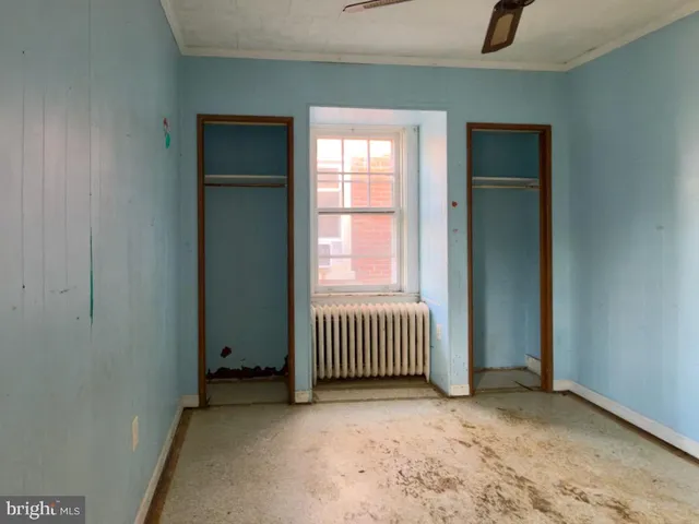 an empty room with windows