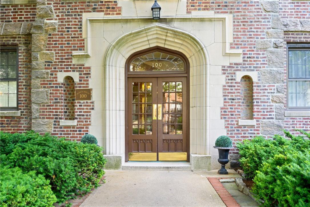 100 Parkway Road, Unit 1E Bronxville, NY 10708 - Photo 1 of 1 a view of building with a garden