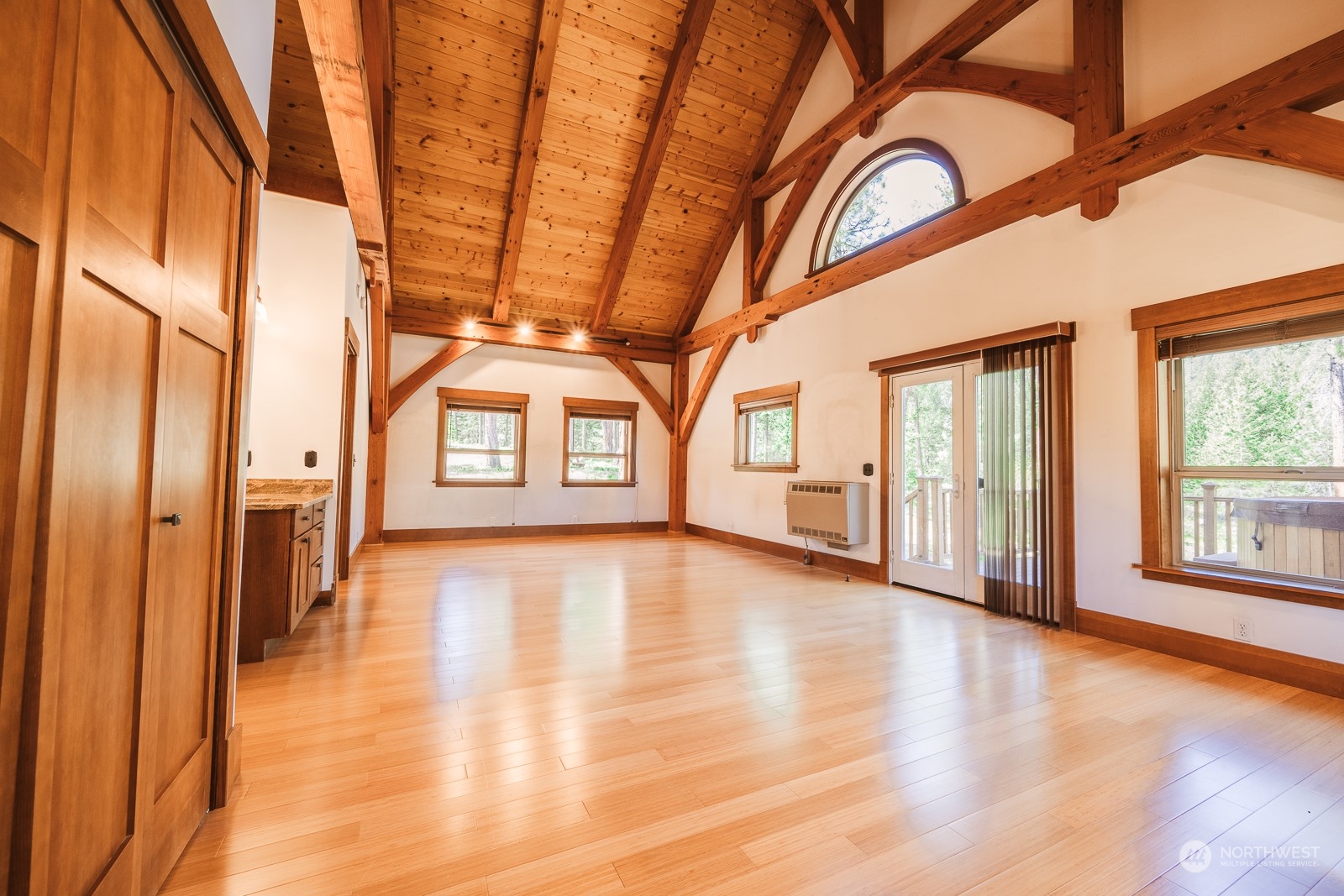 65 Fiddler's Road Winthrop, WA 98862 - Photo 12 of 25 a view of a room with wooden floor and windows