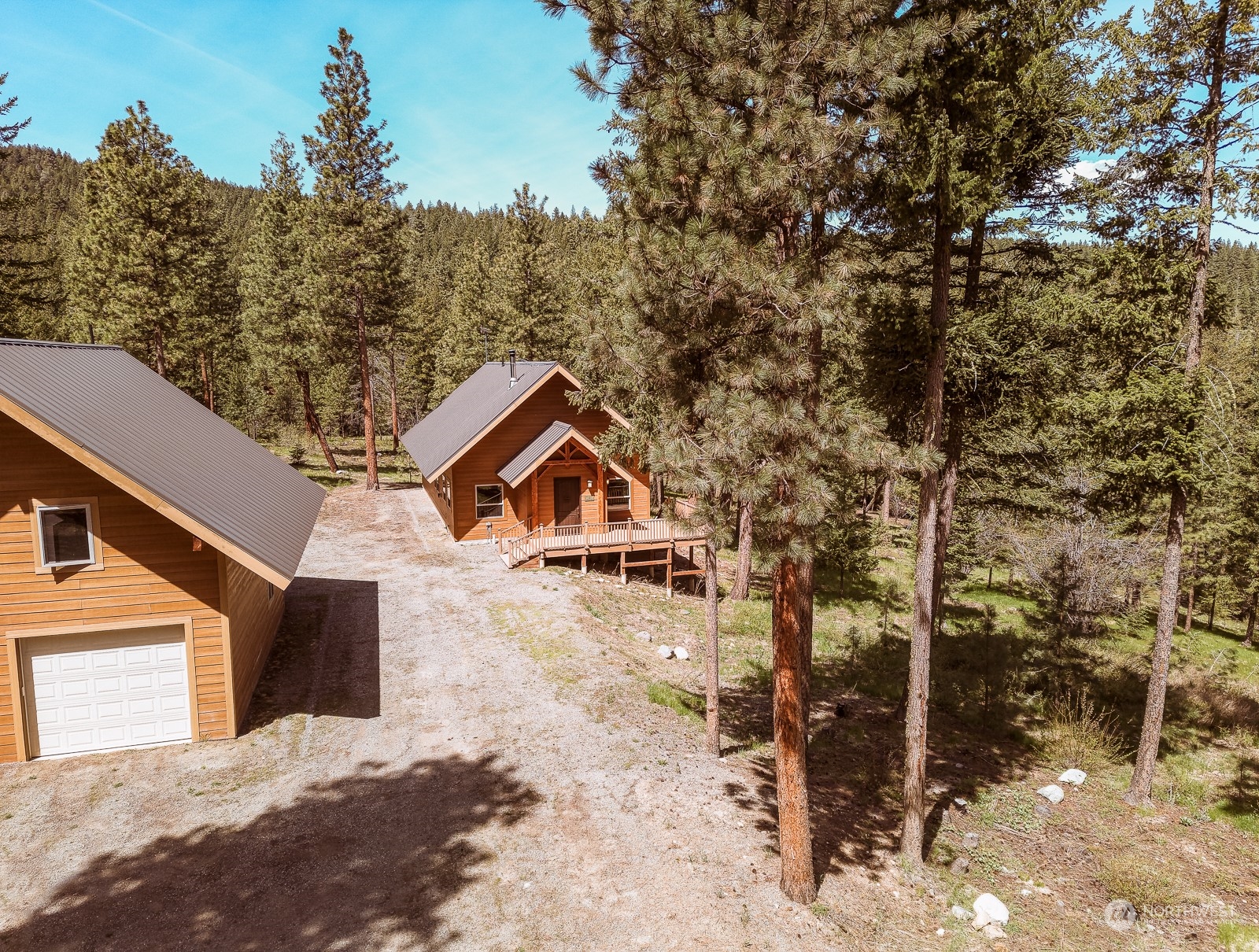 65 Fiddler's Road Winthrop, WA 98862 - Photo 2 of 25 a view of a house with a yard