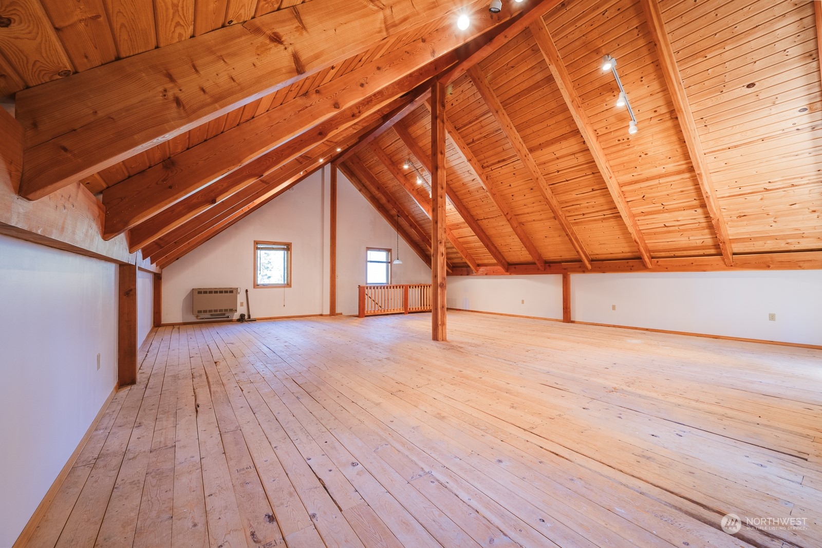 65 Fiddler's Road Winthrop, WA 98862 - Photo 21 of 25 a view of an empty room with wooden floor