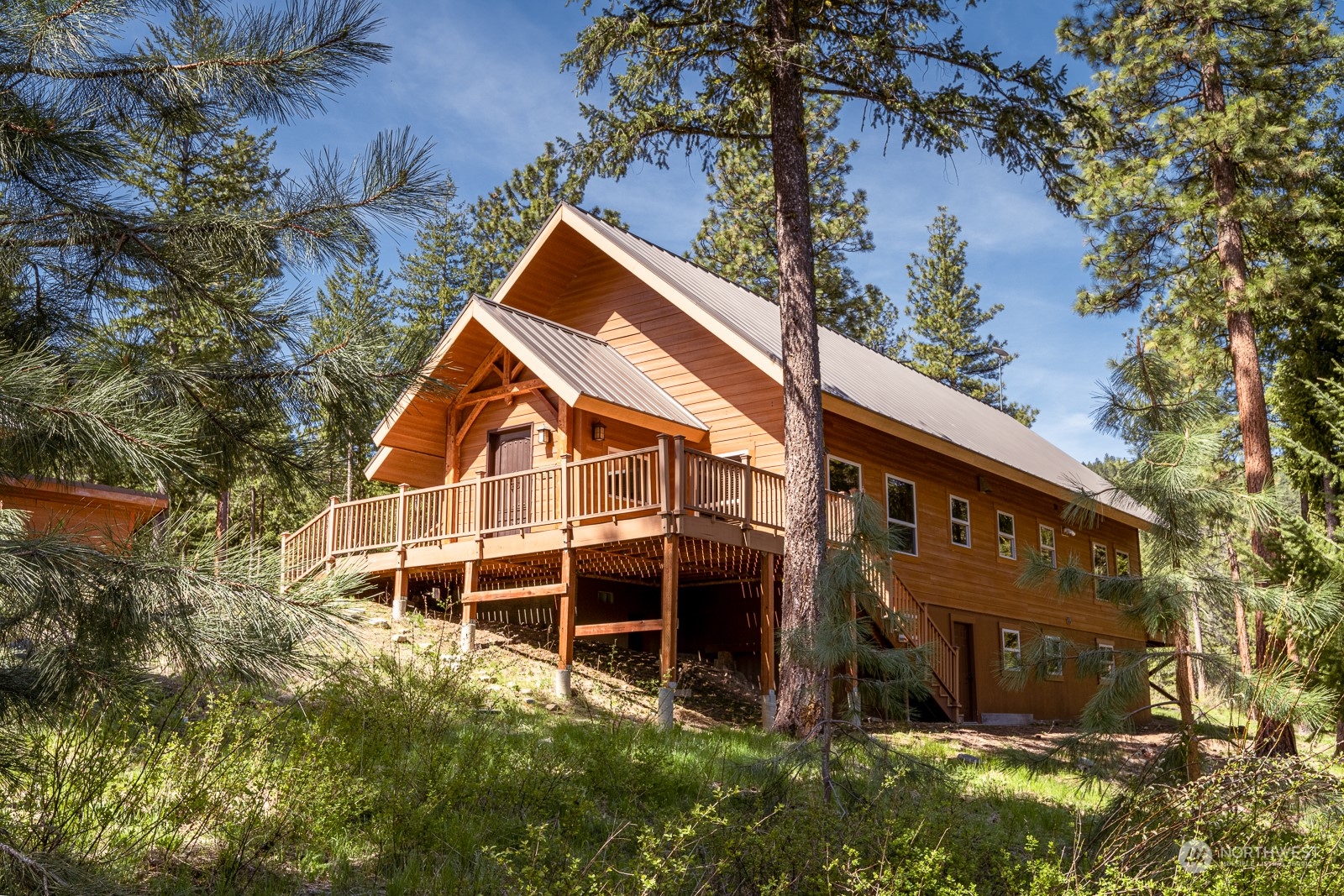 65 Fiddler's Road Winthrop, WA 98862 - Photo 25 of 25 a view of a house with a yard and tree