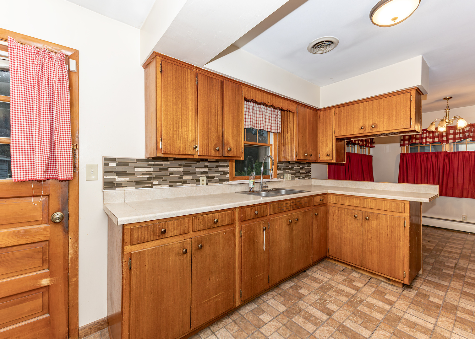 1608 3rd Street Camanche, IA 52730 - Photo 10 of 25 a kitchen with stainless steel appliances granite countertop a sink and a cabinets