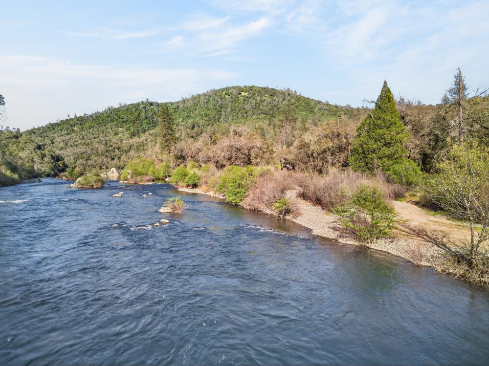 0 Clark Mountain Road Lotus, CA 95651 - Photo 17 of 47 a view of a field with an ocean