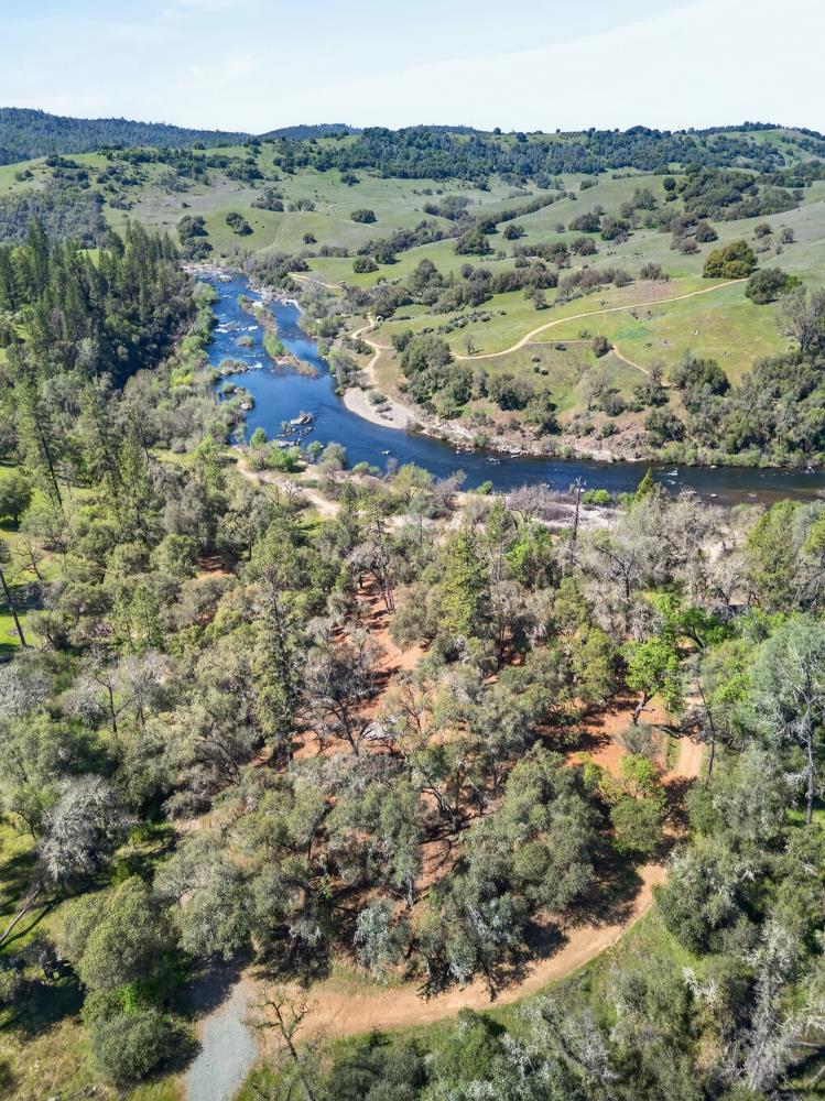 0 Clark Mountain Road Lotus, CA 95651 - Photo 22 of 47 an aerial view of residential houses and outdoor space