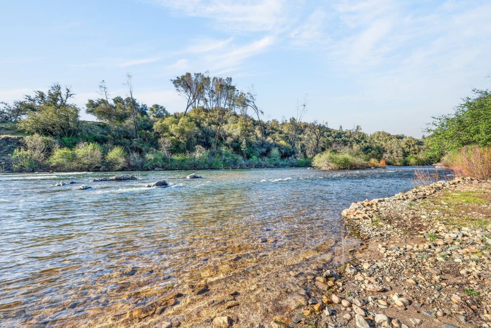 0 Clark Mountain Road Lotus, CA 95651 - Photo 4 of 47 a view of a dry yard with wooden fence
