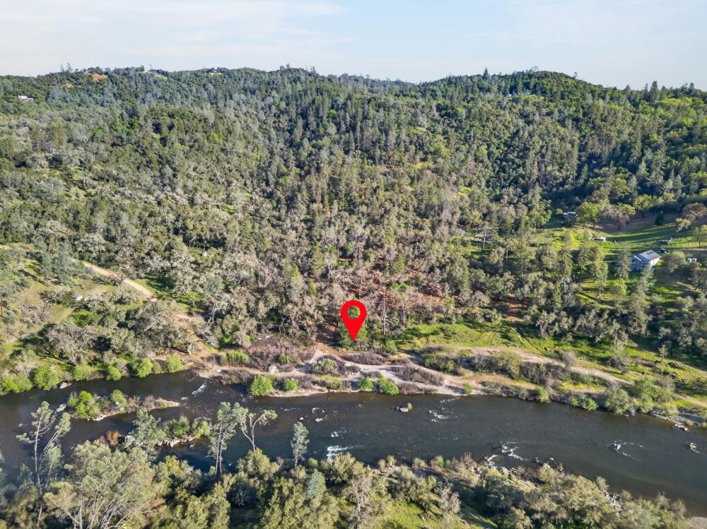 0 Clark Mountain Road Lotus, CA 95651 - Photo 10 of 47 a aerial view of a houses with a yard