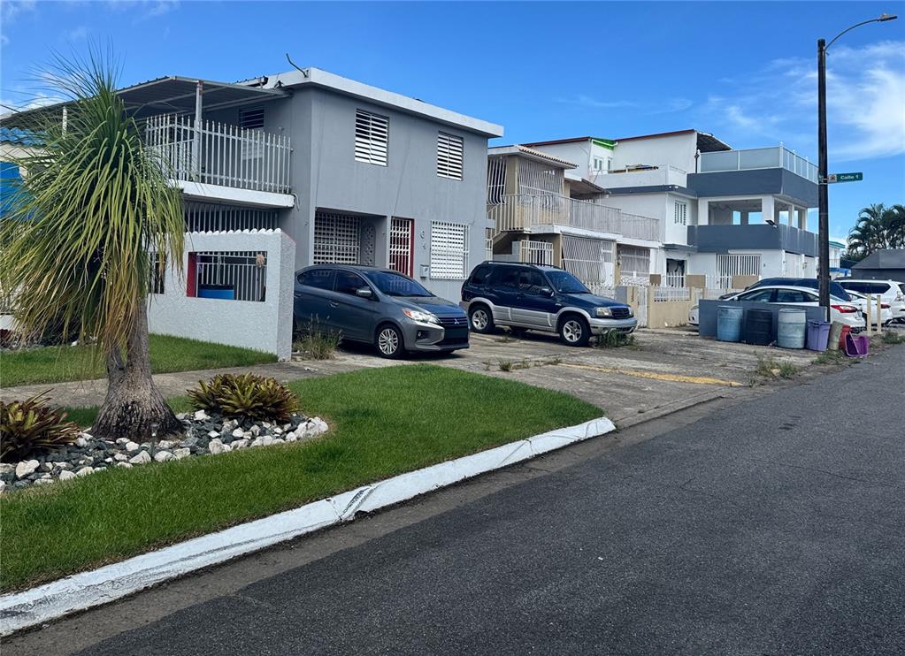 4 7th Street Carolina, PR 00983 - Photo 1 of 1 a view of a house with a yard and sitting area