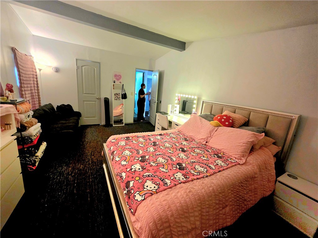 10623 Desert View Road Pinon Hills, CA 92372 - Photo 18 of 76 a bed sitting in a bedroom and bedroom