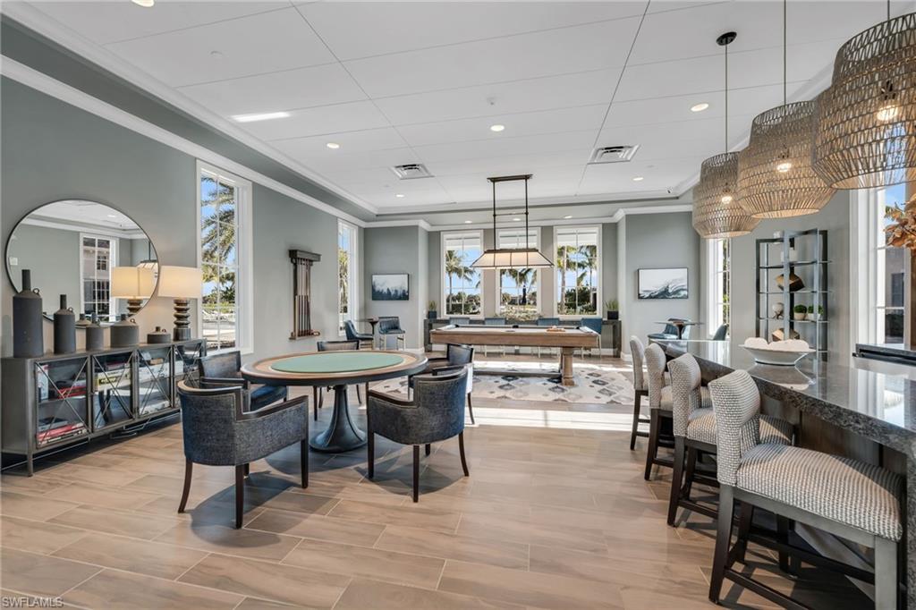 9028 Mayreau Way Naples, FL 34114 - Photo 21 of 24 a living room with furniture and a wooden floor