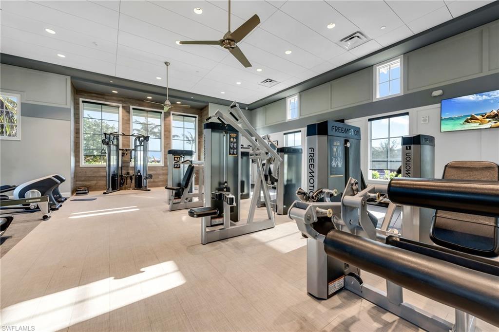 9028 Mayreau Way Naples, FL 34114 - Photo 23 of 24 a view of a room with gym equipment