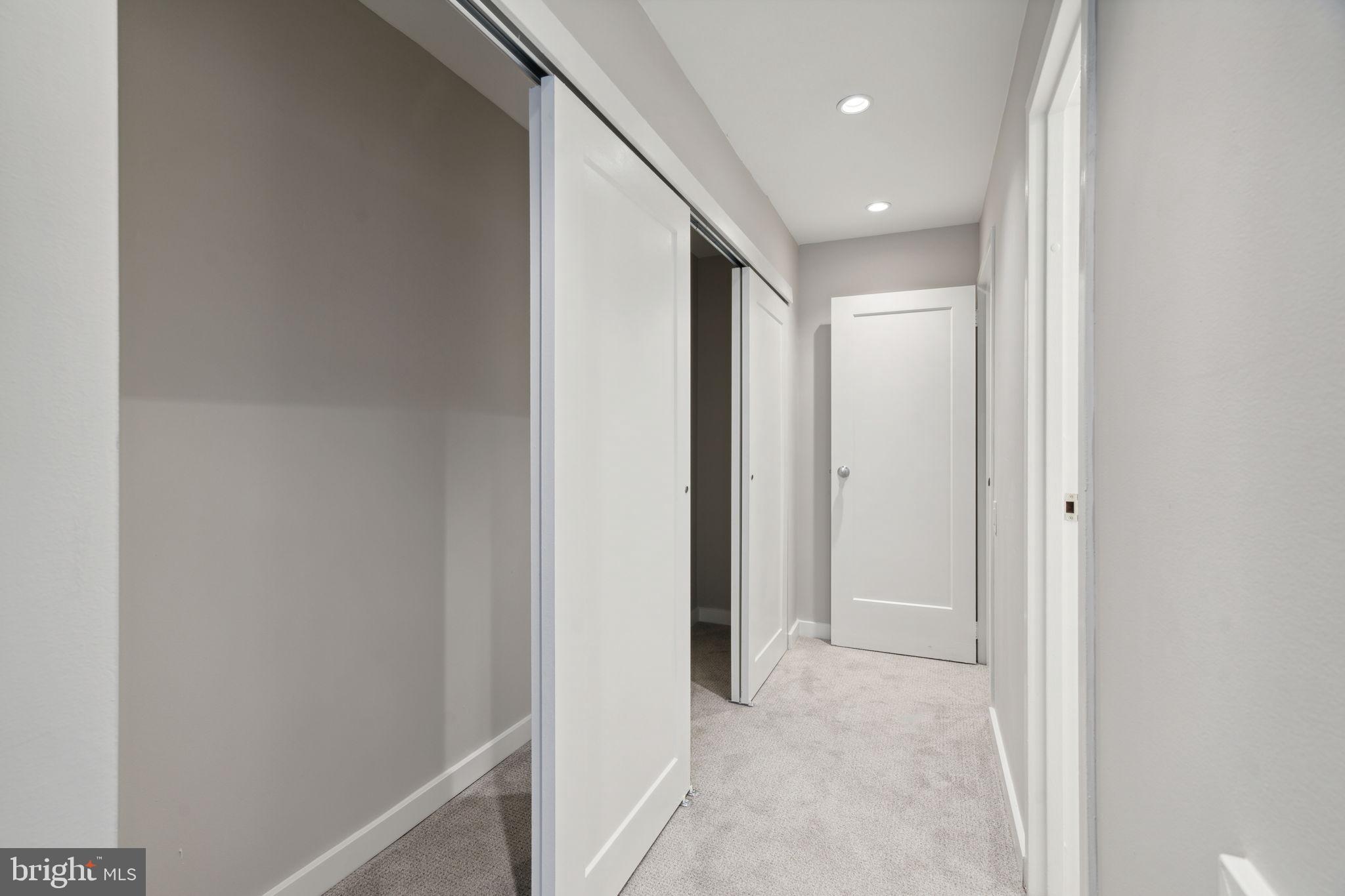 101-111 South 9th Street, Unit PH107 Philadelphia, PA 19107 - Photo 23 of 42 a view of hallway with stainless steel appliances