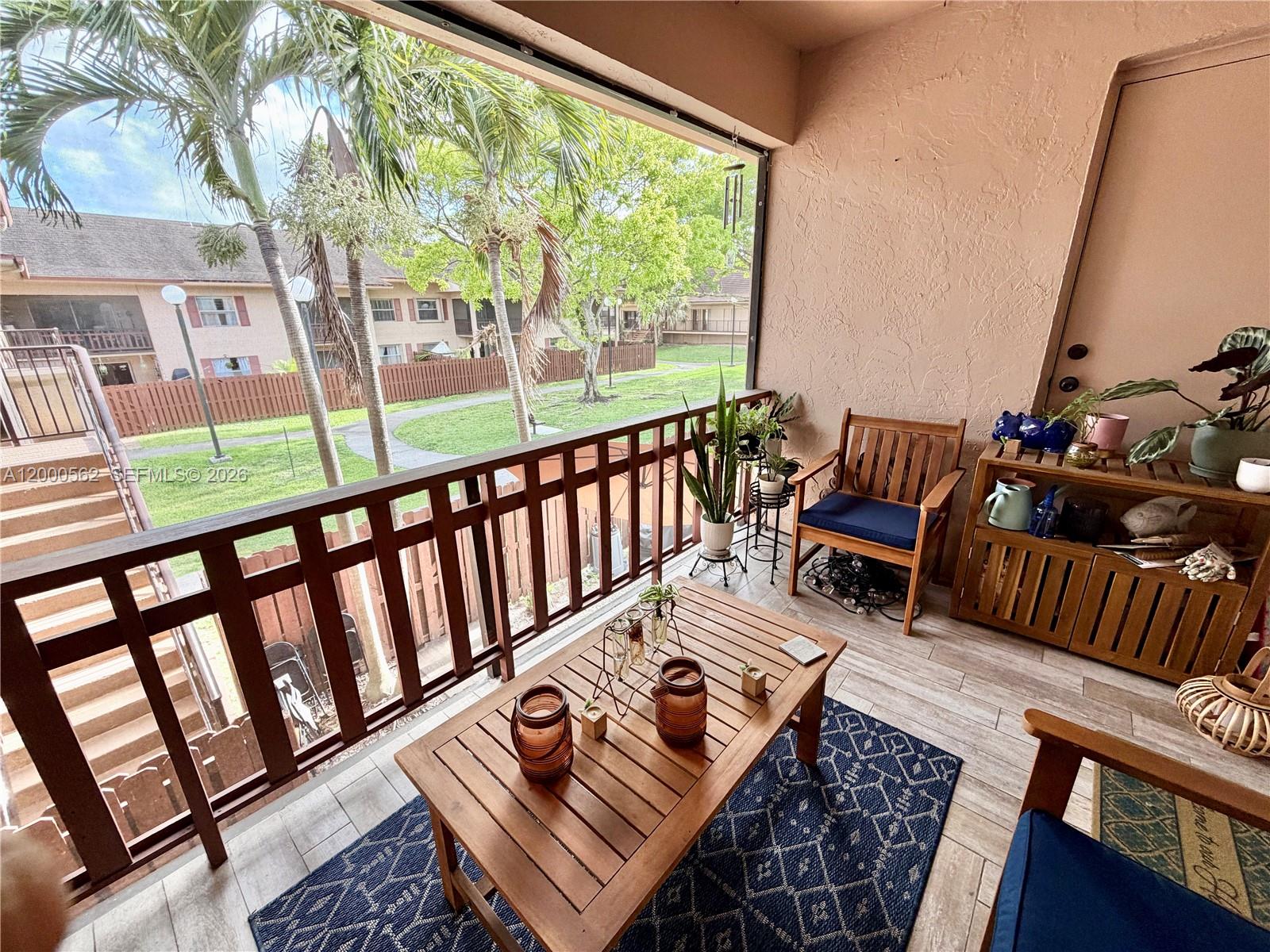 11259 Southwest 88th Street, Unit 204H Miami, FL 33176 - Photo 10 of 15 Screened Porch